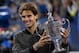Sep 9, 2013; New York, NY, USA; Rafael Nadal (ESP) poses with the championship trophy after defeating Novak Djokovic (SRB) in the men's singles final on day fifteen of the 2013 US Open at USTA Billie Jean King National Tennis Center. Mandatory Credit: Rob