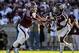 Sep 21, 2013; College Station, TX, USA; Texas A&M Aggies quarterback Johnny Manziel (2) hands off to running back Ben Malena (1) during the first quarter against the Southern Methodist Mustangs at Kyle Field. Mandatory Credit: Troy Taormina-USA TODAY Spor