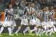TURIN, ITALY - OCTOBER 06: Giorgio Chiellini (C) of Juventus FC celebrates with his team-mates after scoring their third goal during the Serie A match between Juventus and AC Milan at Juventus Arena on October 6, 2013 in Turin, Italy. (Photo by Marco Lu