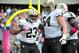 Oct 6, 2013; Chicago, IL, USA; New Orleans Saints running back Pierre Thomas (23) is congratulated by tackle Zach Strief (64) for scoring a touchdown against the Chicago Bears during the second quarter at Soldier Field. Mandatory Credit: Rob Grabowski-USA