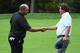 DUBLIN, OH - OCTOBER 06: Jason Dufner of the U.S. Team (L) shakes hands with Brendon de Jonge of South Africa and the International Team on the 15th green after Dufner won the match 4&3 during the Day Four Singles Matches at the Muirfield Village Golf Cl