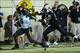Oct 5, 2013; Nashville, TN, USA; Missouri Tigers running back Marcus Murphy (6) stiff arms Vanderbilt Commodores safety Javon Marshall (31) during the first half at Vanderbilt Stadium. Mandatory Credit: Don McPeak-USA TODAY Sports