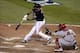 Oct 6, 2013; Pittsburgh, PA, USA; Pittsburgh Pirates third baseman Pedro Alvarez (24) hits a RBI single against the St. Louis Cardinals during the 8th inning in game three of the National League divisional series playoff baseball game at PNC Park. Mandato
