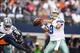 Oct 6, 2013; Arlington, TX, USA; Dallas Cowboys quarterback Tony Romo (9) throws in the pocket against the Denver Broncos at AT&T Stadium. Mandatory Credit: Matthew Emmons-USA TODAY Sports