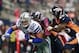 Oct 6, 2013; Arlington, TX, USA; Dallas Cowboys tight end Jason Witten (82) is tackled by Denver Broncos outside linebacker Wesley Woodyard (52) and cornerback Dominique Rodgers-Cromartie (45) during the first quarter at AT&T Stadium. Mandatory Credit: Ti