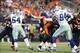 Oct 6, 2013; Arlington, TX, USA; Denver Broncos quarterback Peyton Manning (18) throws in the pocket against the Dallas Cowboys at AT&T Stadium. The Denver Broncos beat the Dallas Cowboys 51-48. Mandatory Credit: Matthew Emmons-USA TODAY Sports