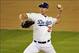 October 6, 2013; Los Angeles, CA, USA; Los Angeles Dodgers starting pitcher Chris Capuano (35) pitches in the sixth inning against the Atlanta Braves in game three of the National League divisional series playoff baseball game at Dodger Stadium. Mandatory