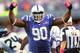 INDIANAPOLIS, IN - OCTOBER 06: Cory Redding #90 of the Indianapolis Colts reacts after a defensive stop against the Seattle Seahawks at Lucas Oil Stadium on October 6, 2013 in Indianapolis, Indiana. Indianapolis defeated Seattle 34-28. (Photo by Michael H