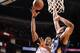 HOUSTON, TX - OCTOBER 5: Dwight Howard #12 of the Houston Rockets goes up to the rim against Anthony Davis #23 of the New Orleans Pelicans during the 2013 NBA pre-season game on October 5, 2013 at the Toyota Center in Houston, Texas. NOTE TO USER: User e