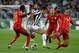 TURIN, ITALY - OCTOBER 02: Mirko Vucinic of Juventus and Felipe Melo of Galatasaray AS (R) compete for the ball during UEFA Champions League Group B match between Juventus and Galatasaray AS at Juventus Arena on October 2, 2013 in Turin, Italy. (Photo b