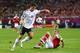 L'VIV, UKRAINE - JUNE 17: Mario Gomez of Germany and Daniel Agger of Denmark compete for the ball during the UEFA EURO 2012 group B match between Denmark and Germany at Arena Lviv on June 17, 2012 in L'viv, Ukraine. (Photo by Martin Rose/Getty Images)