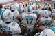 MIAMI GARDENS, FL - OCTOBER 06: Ryan Tannehill #17 of the Miami Dolphins gets ready to take the field during a game against the Baltimore Ravens at Sun Life Stadium on October 6, 2013 in Miami Gardens, Florida. (Photo by Mike Ehrmann/Getty Images)