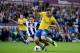 WEST BROMWICH, ENGLAND - OCTOBER 06: Jack Wilshere of Arsenal is challenged by Billy Jones of West Bromwich Albion during the Barclays Premier League match between West Bromwich Albion and Arsenal at The Hawthorns on October 6, 2013 in West Bromwich, Eng