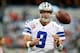 Oct 6, 2013; Arlington, TX, USA; Dallas Cowboys quarterback Tony Romo (9) catches a ball during warmups before the game Denver Broncos at AT&T Stadium. Mandatory Credit: Tim Heitman-USA TODAY Sports