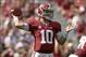 Oct 5, 2013; Tuscaloosa, AL, USA; Alabama Crimson Tide quarterback A.J. McCarron (10) rolls out to pass against the Georgia State Panthers during the second quarter at Bryant-Denny Stadium. Mandatory Credit: John David Mercer-USA TODAY Sports