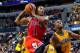 INDIANAPOLIS, IN - OCTOBER 05: Derrick Rose #1 of the Chicago Bulls takes the ball to the hoop against David West #21 of the Indiana Pacers on October 5, 2013 at Bankers Life Fieldhouse in Indianapolis, Indiana. Chicago defeated Indiana 82-76. NOTE TO USE