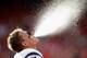 SAN FRANCISCO, CA - OCTOBER 06: J.J. Watt #99 of the Houston Texans spits water into the air before their game against the San Francisco 49ers at Candlestick Park on October 6, 2013 in San Francisco, California. (Photo by Ezra Shaw/Getty Images)