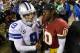 LANDOVER, MD - DECEMBER 30: Quarterbacks Tony Romo #9 of the Dallas Cowboys and Robert Griffin III #10 of the Washington Redskins talk following the Redskins 28-18 win at FedExField on December 30, 2012 in Landover, Maryland. (Photo by Rob Carr/Getty Ima