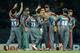 COLOMBO, SRI LANKA - SEPTEMBER 19: Karim Sadiq of Afghanistan celebrates with teammates after dismissing Yuvraj Singh of India during the ICC World Twenty20 2012: Group A match between India and Afghanistan at R. Premadasa Stadium on September 19, 2012