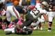 CHICAGO, IL - OCTOBER 06: Pierre Thomas #23 of the New Orleans Saints is tackled by Major Wright #21 of the Chicago Bears at Soldier Field on October 6, 2013 in Chicago, Illinois. The Saints defeated the Bears 26-18. (Photo by Jonathan Daniel/Getty Imag