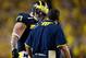 ANN ARBOR, MI - SEPTEMBER 07: Head coach Brady Hoke talks with Taylor Lewan #77 of the Michigan Wolverines while playing the Notre Dame Fighting Irish at Michigan Stadium on September 7, 2013 in Ann Arbor, Michigan. Michigan won the game 41-30. (Photo by