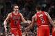 Jan 13, 2012; Boston, MA, USA; Chicago Bulls center Joakim Noah (13) and point guard Derrick Rose (1) celebrate during the second half against the Boston Celtics at TD Banknorth Garden. Mandatory Credit: Mark L. Baer-USA TODAY Sports