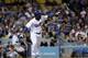 LOS ANGELES, CA - SEPTEMBER 12: Yasiel Puig #66 of the Los Angeles Dodgers throws his bat as he watches his RBI double to break a 1-1 tie in the seventh inning against the San Francisco Giants at Dodger Stadium on September 12, 2013 in Los Angeles, Cali