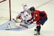 WASHINGTON, DC - OCTOBER 03: Alex Ovechkin #8 of the Washington Capitals score in the shootout against Karri Ramo #31 of the Calgary Flames at the Verizon Center on October 3, 2013 in Washington, DC. The Capitals defeated the Flames 5-4 in the shootout.