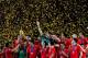 JOHANNESBURG, SOUTH AFRICA - JULY 11: The Spain team celebrate winning the World Cup as captain Iker Casillas (C) waves to fans during the 2010 FIFA World Cup South Africa Final match between Netherlands and Spain at Soccer City Stadium on July 11, 2010