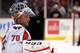 CHICAGO, IL - OCTOBER 01: Braden Holtby #70 of the Washington Capitals rests during a break in the action against the Chicago Blackhawks at the United Center on October 1, 2013 in Chicago, Illinois. The Blackhawks defeated the Capitals 6-4. (Photo by Jo