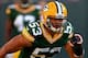 GREEN BAY, WI - AUGUST 09: Nick Perry #53 of the Green Bay Packers participates in warm-ups before a game against the Arizona Cardinals at Lambeau Field on August 9, 2013 in Green Bay, Wisconsin. The Cardinals defeated the Packers 17-0. (Photo by Jonath