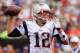CINCINNATI, OH - OCTOBER 6: Quarterback Tom Brady #12 of the New England Patriots passes against the Cincinnati Bengals in the first quarter at Paul Brown Stadium on October 6, 2013 in Cincinnati, Ohio. (Photo by Jamie Sabau/Getty Images)