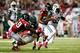 ATLANTA, GA - OCTOBER 07: Running back Chris Ivory #33 of the New York Jets breaks a tackle by outside linebacker Joplo Bartu #59 and free safety Thomas DeCoud #28 of the Atlanta Falcons during their game at the Georgia Dome on October 7, 2013 in Atlanta,