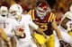 AMES, IA - OCTOBER 3: Defensive end Nick Kron #69 of the Iowa State Cyclones puts pressure on quarterback Case McCoy #6 of the Texas Longhorns in the second half of play at Jack Trice Stadium on October 3, 2013 in Ames, Iowa. Texas defeated Iowa State 31