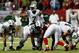 ATLANTA, GA - OCTOBER 07: Quarterback Geno Smith #7 of the New York Jets calls a play against the Atlanta Falcons during their game at the Georgia Dome on October 7, 2013 in Atlanta, Georgia. (Photo by Kevin C. Cox/Getty Images)