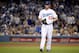 LOS ANGELES, CA - OCTOBER 07: Pitcher Clayton Kershaw #22 of the Los Angeles Dodgers reacts in the fourth inning while taking on the Atlanta Braves in Game Four of the National League Division Series at Dodger Stadium on October 7, 2013 in Los Angeles, C