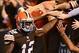 Oct 3, 2013; Cleveland, OH, USA; Cleveland Browns wide receiver Josh Gordon (12) celebrates with fans after catching a pass for a touchdown during the third quarter against the Buffalo Bills at FirstEnergy Stadium. Mandatory Credit: Andrew Weber-USA TODAY