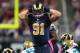 ST. LOUIS, MO - OCTOBER 6: Chris Long #91 of the St. Louis Rams celebrates after sacking Blaine Gabbert #11 of the Jacksonville Jaguars at the Edward Jones Dome on October 6, 2013 in St. Louis, Missouri. (Photo by Dilip Vishwanat/Getty Images)
