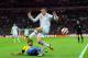 LONDON, ENGLAND - FEBRUARY 06: Daniel Alves of Brazil (L) tackles Jack Wilshere of England during the International friendly between England and Brazil at Wembley Stadium on February 6, 2013 in London, England. (Photo by Shaun Botterill/Getty Images)