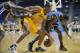 October 5, 2013; Ontario, CA, USA; Golden State Warriors point guard Toney Douglas (0) turns the ball over against the defense of the Los Angeles Lakers shooting guard Wesley Johnson (11) during the second half at Citizens Business Bank Arena. Mandatory C