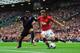 MANCHESTER, ENGLAND - SEPTEMBER 14: Adnan Januzaj of Manchester United takes on Jason Puncheon of Crystal Palace during the Barclays Premier League match between Manchester United and Crystal Palace at Old Trafford on September 14, 2013 in Manchester, En