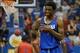 Oct 4, 2013; Lawrence, KS, USA; Kansas Jayhawks guard Andrew Wiggins (22) laughs with team mates after scoring during Late Night at Allen Fieldhouse. Mandatory Credit: Denny Medley-USA TODAY Sports