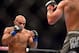 Aug 3, 2013; Rio De Janeiro, Brazil; Ian McCall (red gloves) and Iliarde Santos fight during UFC 163 at HSBC Arena. Mandatory Credit: Jason Silva-USA TODAY Sports