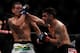 Leonard Garcia (right) remained employed by the UFC after losing five fights in a row - Esther Lin/MMAFighting