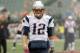 Oct 6, 2013; Cincinnati, OH, USA; New England Patriots quarterback Tom Brady (12) warms up before the game against the Cincinnati Bengals at Paul Brown Stadium. Mandatory Credit: Mark Zerof-USA TODAY Sports