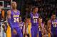 DENVER, CO - FEBRUARY 25: Kobe Bryant #24, Dwight Howard #12 and Metta World Peace #15 of the Los Angeles Lakers walk to the sideline for a timeout during their game against the Denver Nuggets on February 25, 2013 at the Pepsi Center in Denver, Colorado.