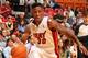 MIAMI, FL - OCTOBER 7: Norris Cole #30 of the Miami Heat dribbles to the rim against the Atlanta Hawks during a game on October 7, 2013 at American Airlines Arena in Miami, Florida. NOTE TO USER: User expressly acknowledges and agrees that, by downloading