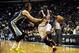 Oct 7, 2013; St. Louis, MO, USA; Chicago Bulls small forward Luol Deng (9) handles the ball as Memphis Grizzlies small forward Mike Miller (13) defends during the second quarter at Scottrade Center. Chicago defeated Memphis 106-87. Mandatory Credit: Jeff