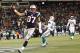 Dec 30, 2012; Foxborough, MA, USA; New England Patriots tight end Rob Gronkowski (87) scores a touchdown against the Miami Dolphins during the second half at Gillette Stadium. Mandatory Credit: Mark L. Baer-USA TODAY Sports