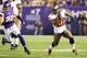 MINNEAPOLIS, MN - OCTOBER 25: Doug Martin #22 of the Tampa Bay Buccaneers outruns Harrison Smith #22 of the Minnesota Vikings for a gain at the Hubert H. Humphrey Metrodome on October 25, 2012 in Minneapolis, Minnesota. (Photo by Adam Bettcher/Getty Imag